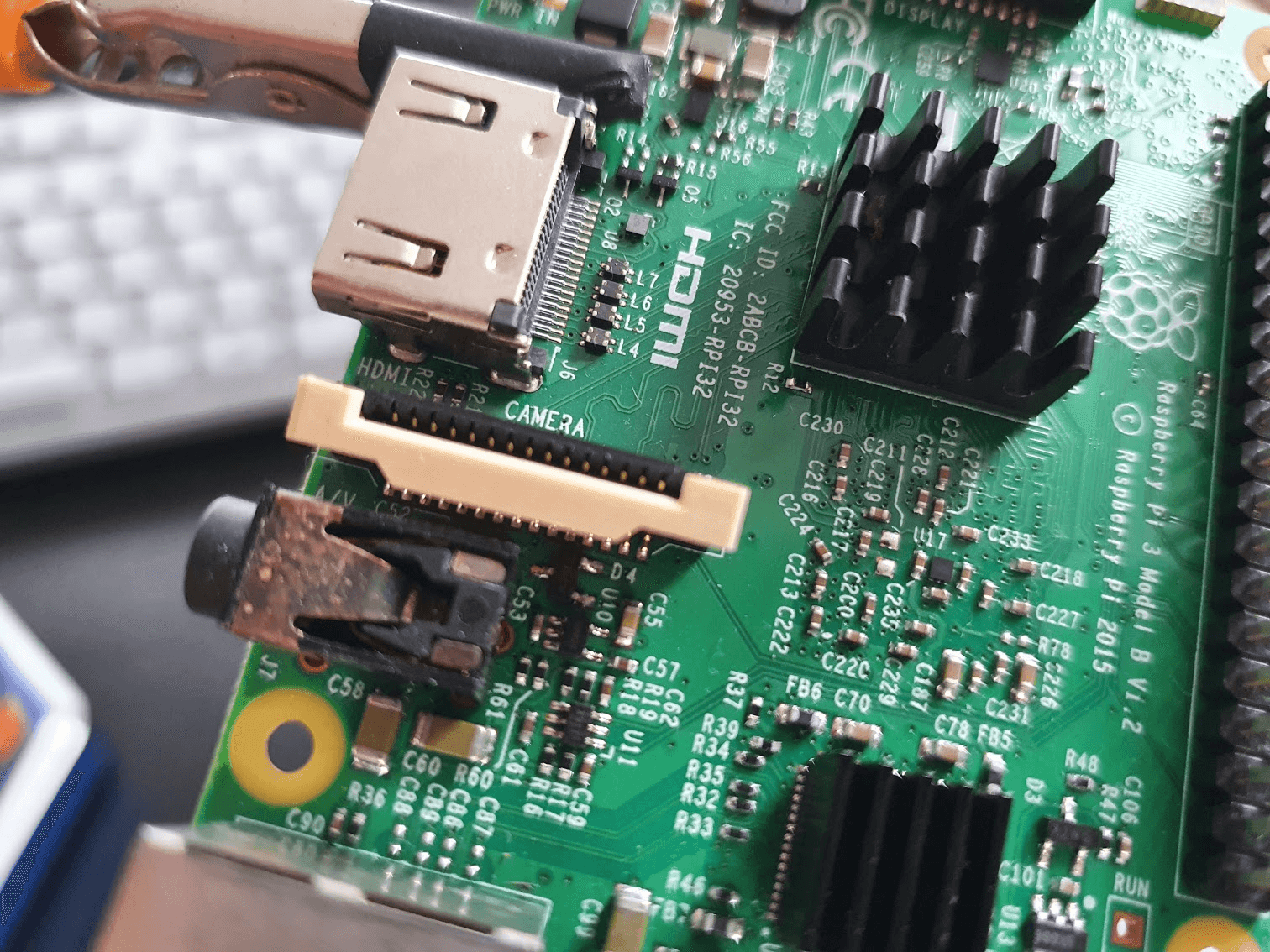 The Raspberry Pi 3B CSI connector, notice the pins are facing away from the white locking tab